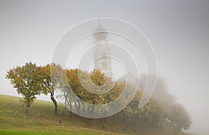 san Valentino church on a foggy late autumn day, Siusi allo Sciliar, Castelrotto, Dolomites, Italy