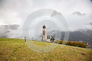 san Valentino church on a foggy late autumn day, Siusi allo Sciliar, Castelrotto, Dolomites, Italy