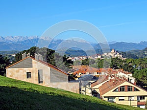 San Vicente de la Barquera and impressive Picos de Europa mountain range in the Northern Spain