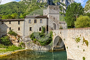 San Vittore alle Chiuse. Roman Catholic abbey and church. The edifice is known from the year 1011. Ponte Romano. Roman bridge over photo