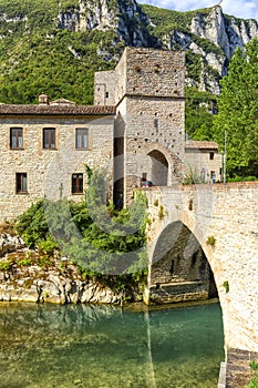 San Vittore alle Chiuse. Roman Catholic abbey and church. The edifice is known from the year 1011. Ponte Romano. Roman bridge over photo