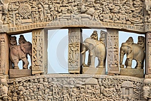 Sanchi Stupa, ancient buddhist hindu statue details, religion mystery, carved stone. Travel destination in Madhya Pradesh, India.