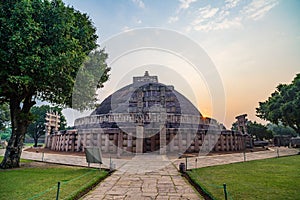 Sanchi Stupa, Madhya Pradesh, India. Ancient buddhist building, religion mystery, carved stone. Sunrise sky.