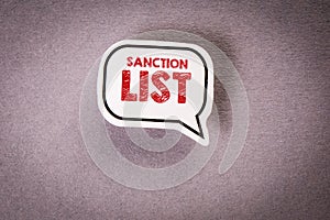 SANCTION LIST. Speech bubble with text on gray background