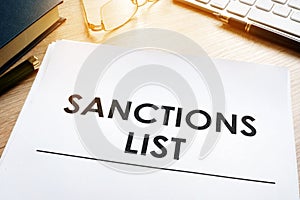 Sanctions list on a desk. Government act for sanctioned countries concept.