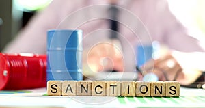 Sanctions and regulation of oil trading businessman considers financial losses.