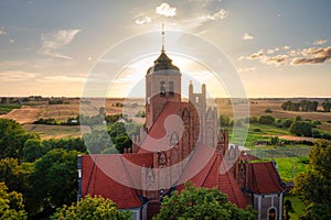 Sanctuary in Piaseczno illuminated by the setting sun, Poland