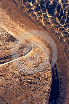 textures in the sand of the beach