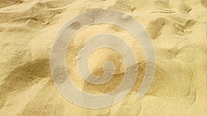 Sand background, footprints in the sand