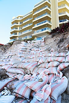 Sand bags against beach erosion photo