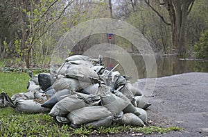 Sand bags protecting homes in a flood zone