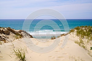 Sand beach access with dunes of Le Porge near Lacanau in France
