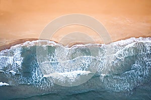 Sand beach aerial, top view of a beautiful sandy beach.