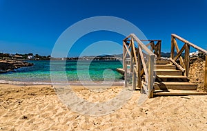 Sand beach with beautiful sea water at Porto Colom, Majorca