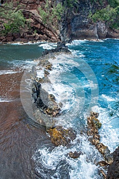 Sand Beach, Maui in in Hawaiian. Sea Wave and rock, summer beach background.