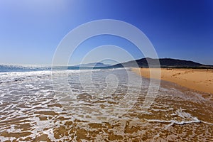 Sand beach and mountain. Mediteran. photo
