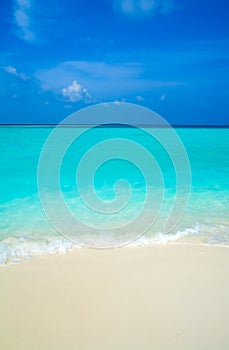 Sand beach and ocean wave photo