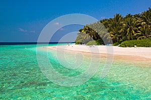 Sand beach and ocean wave, South Male Atoll. Maldives