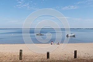 Sand beach in summer day in Lacanau Medoc village in France