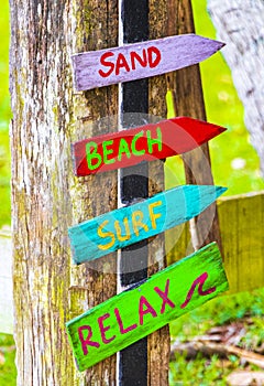 Sand beach surf relax colorful directional arrows Ilha Grande Brazil