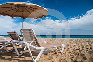 Sand, Beach, umbrella and chairs