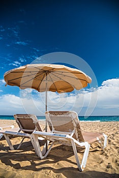 Sand, Beach, umbrella and chairs