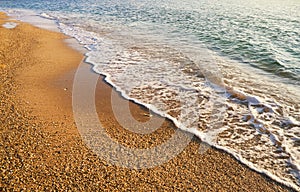 Sand beach and wave.
