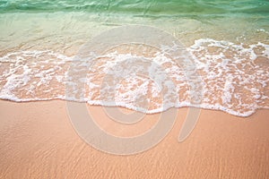 Sand beach with white sea soft wave on top view