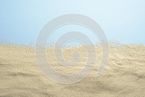 Sand and blue background