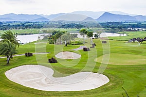 Sand bunker at the beautiful golf course.