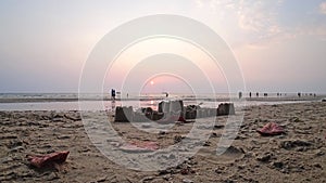 Sand castle on the beach. Sunset on the island.