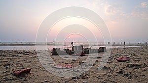 Sand castle on the beach. Sunset on the island.