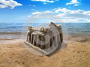 Sand castle copy of Acropolis Greece on the beach