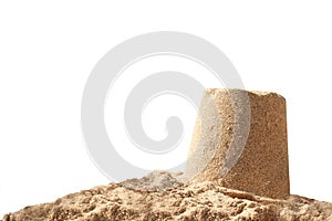 Sand castle isolated on white background