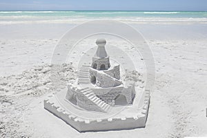 Sand Castle On A White Sandy Beach