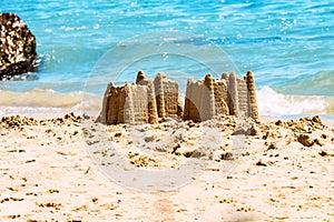 Sand castles on the beach,vacation concept. Holiday concept with sandcastle on the seaside