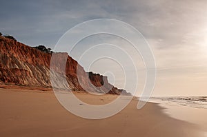 Sand cliff and the sea at portuguese beach in Albufeira
