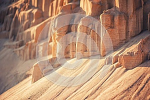 Sand cliffs in industrial quarry background