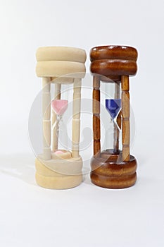 Sand watches representing woman and man photo