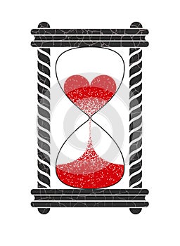 Sand clock with red sand in heart shaped isolated on white background