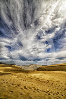 Sand and clouds photo