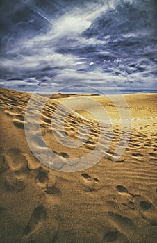 Sand and clouds photo