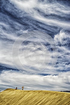 Sand and clouds photo