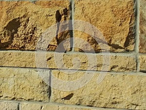sand colored block wall photo