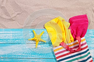 Sand copy space. Sand background top view. Sand copy space. Sand background top view. Beach towels and starfish