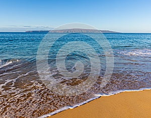 The Sand Covered Shore of Big Beach With Kaho\' Olawe Island