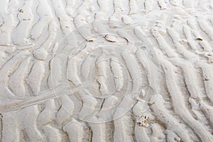 Sand curve texture on the beach