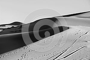 Sand dune in desert in black and white