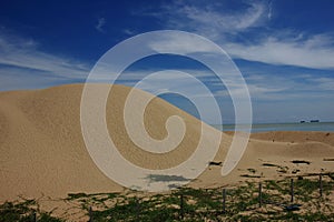 Sand dune of Pantai Mek Mas Beach in Kelantan, Malaysia.