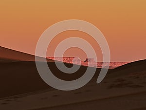 Sand dune, Sahara Desert, with the views of argelia photo